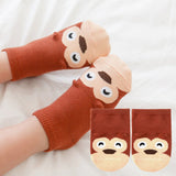 Brown monkey baby socks with ears