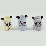 Delightful baby socks with faces on the back